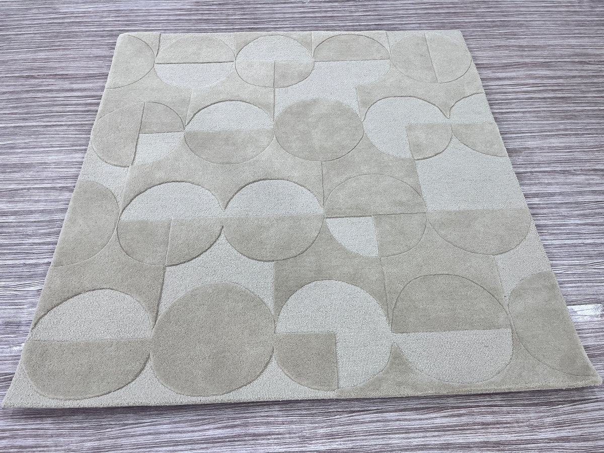 Orbit – Teppich mit skulpturalem Kreisrelief
