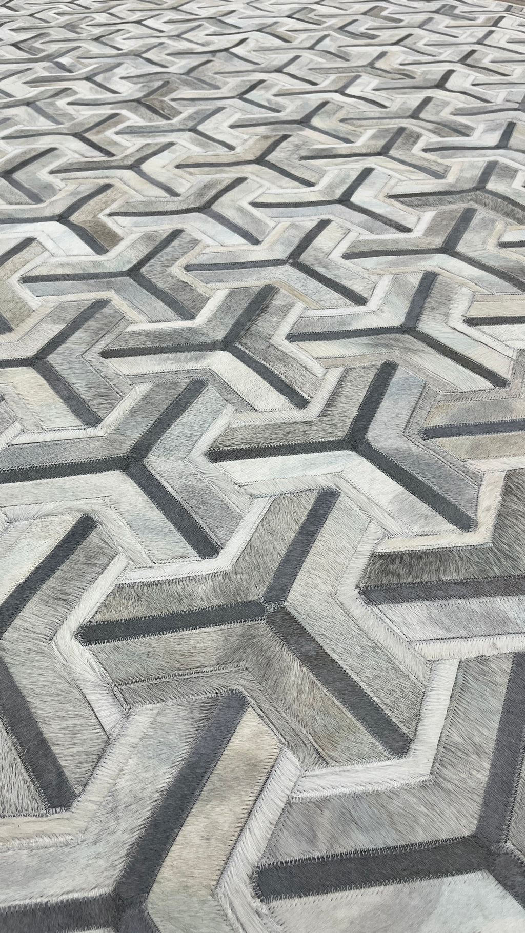 Grey Junction – Geometric patchwork leather rug
