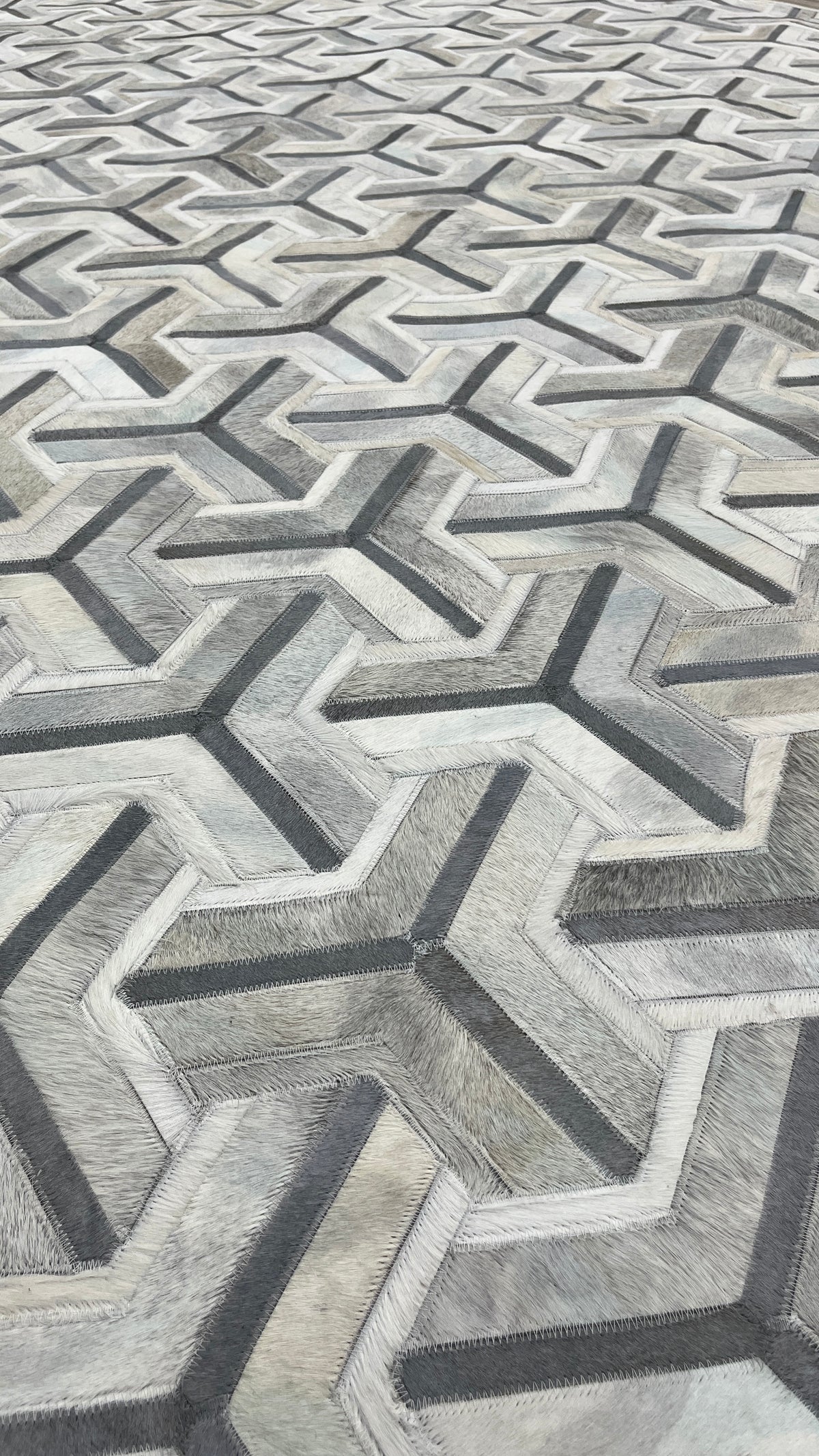 Grey Junction – Geometric patchwork leather rug