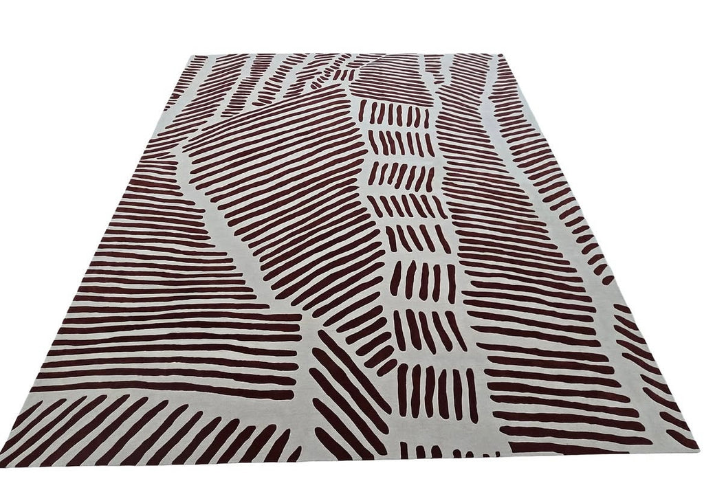 Organic Lines – Wool rug in terracotta & cream