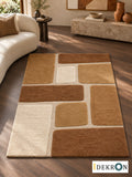Basel Spiced Tessera: hand-tufted wool rug in honey yellow, caramel, cinnamon brown and ivory, in a modern living room with coordinated art.