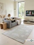 Orbit – Teppich mit skulpturalem Kreisrelief