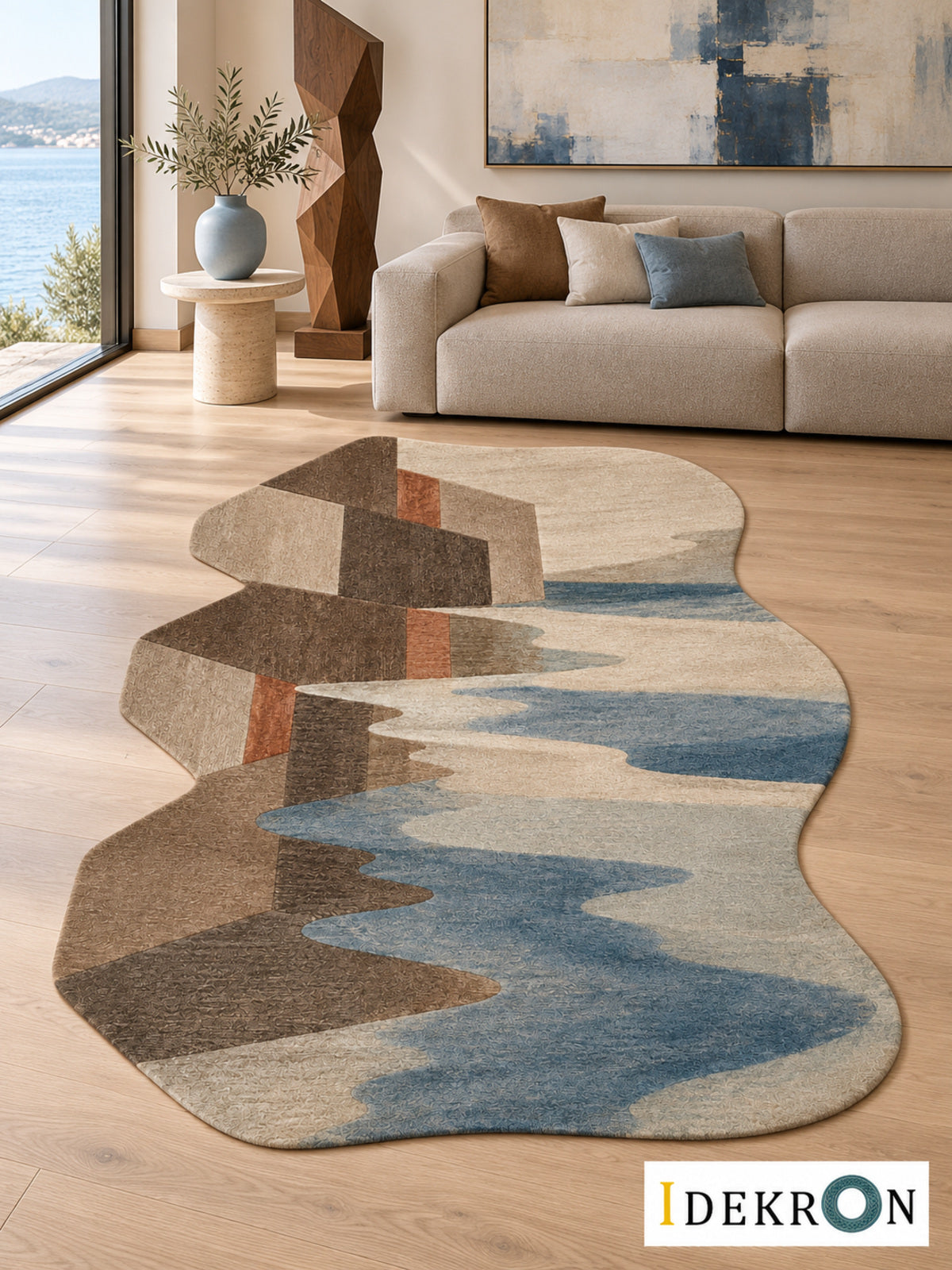 Lucerne Gable Echo: hand-tufted wool rug in walnut brown, parchment, taupe, muted blue and rust red, in a modern living room with coordinated art.