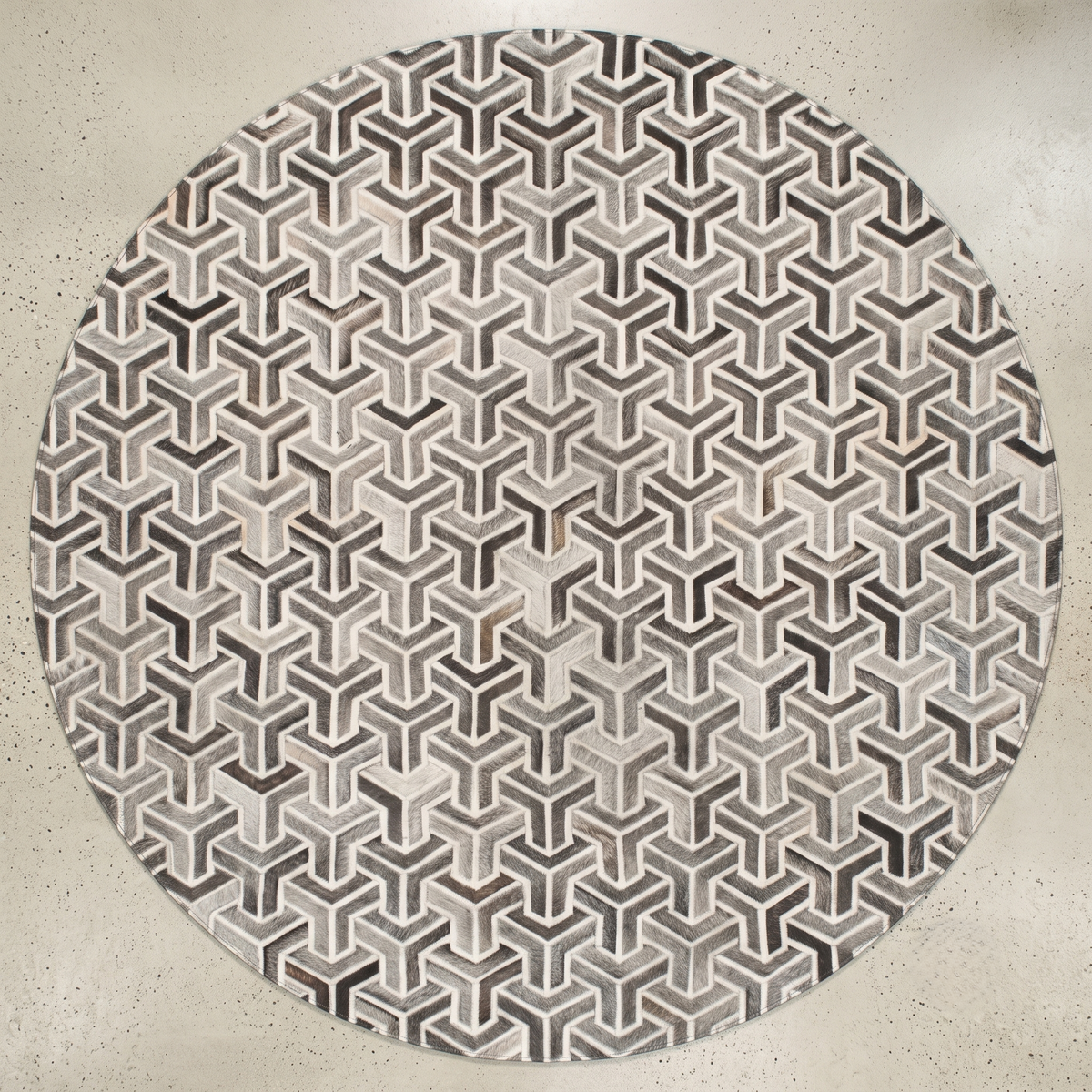 Trinity – Geometric patchwork leather rug